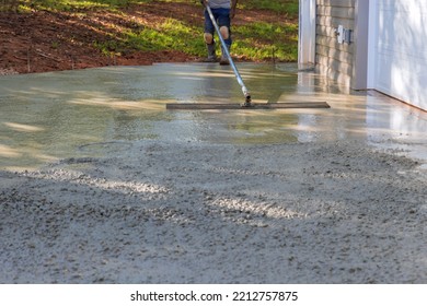 Mason Worker Plastered The Leveling Cement Concrete Patio Floor Using Long Trowel