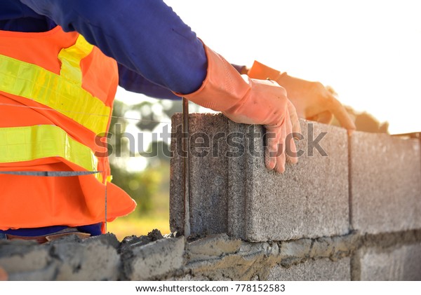 Masonry Construction Worker Standard Safety Uniform Stock Photo (Edit