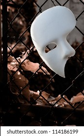 Masquerade - Phantom of the Opera Mask on Rusty Chainlink Fence