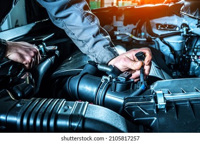 Mass air flow sensor checking. Car diagnostics in auto service. - Shutterstock ID 2105817257