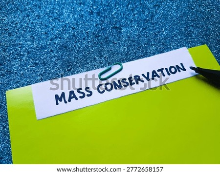 Mass conversion writting on blue background. 
