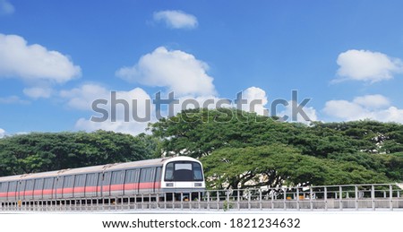 Mass rapid train MRT travel on the track oldest metro at Singapore
