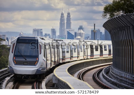 Mass Rapid Transit (MRT) train approaching towards camera. MRT system forming the major component of the railway system in Kuala Lumpur, Malaysia. 