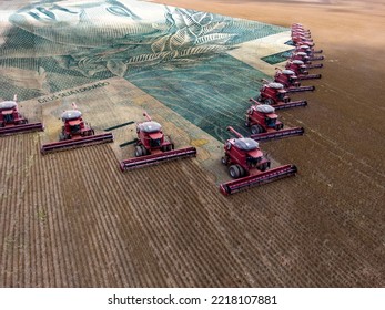 Mass soybean harvesting at a farm in Mato Grosso state,Brazil. Concept brazilian real bank note wirh agribusiness. and commodities. - Shutterstock ID 2218107881