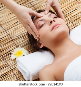 Massage Of Face For Woman In Spa Salon