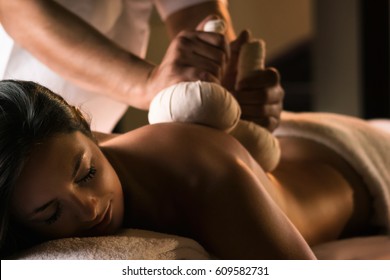 Massage With Herbal Balls. Luxury Spa Treatment