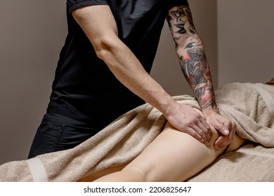 Massage on the problem areas of the body for weight loss and body correction. Master massage therapist makes anti-cellulite massage to a young girl. Spa treatments relaxing massage. - Shutterstock ID 2206825647