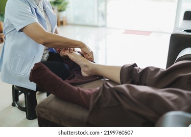 Massage spa relaxing treatment office syndrome traditional thai massage. Asian senior woman thai traditional medicine wearing mask massage treat hand, back pain, arm pain, foot pain, feet and stress. - Powered by Shutterstock