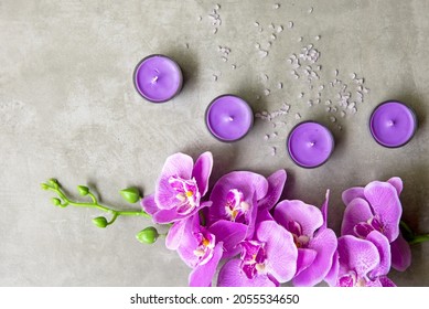 Massage Spa. Thai Spa Treatments Aroma Therapy Salt And Sugar Scrub Massage With Purple Orchid Flower On Backboard With Candle. Thailand. Healthy Concept.