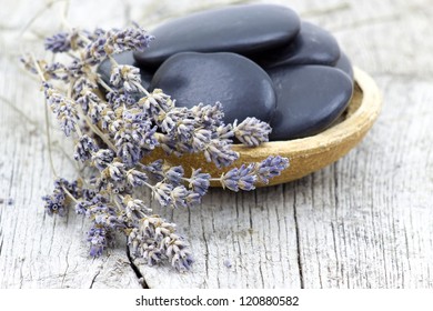 Massage Stones And Dried Lavender