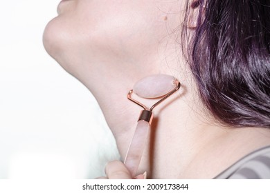 Massaging Female Neck With Quartz Roller Massager Close Up In Technique Of Traditional Chinese Gua Sha Massage