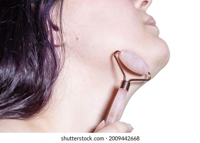 Massaging Neck With Quartz Roller Massager Close Up In Technique Of Traditional Chinese Gua Sha Massage Isolated On White Background