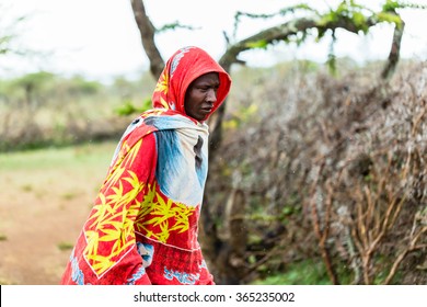 Massai Man Standing In The Rain