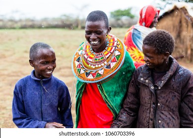 Massai Tribe Family - Mother With Her Children And Husband