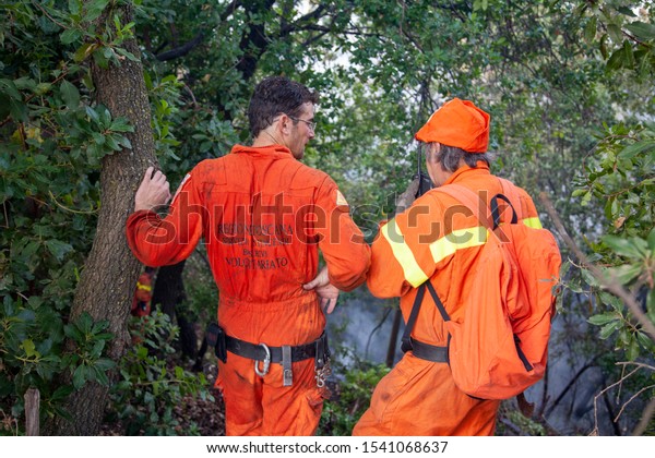 Massarosa, Lucca/Italy - aug 29\
2008: the Civil Protection volunteers intervene to extinguish a\
forest fire in the hills of Massarosa in the province of\
Lucca