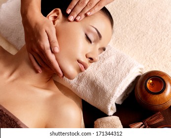 Masseur Doing Massage On Woman Body In The Spa Salon. Beauty Treatment Concept.