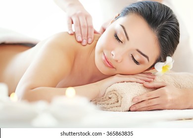 Masseur Doing Massage On Woman Back In The Spa Salon