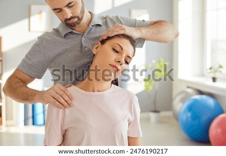 Similar – Image, Stock Photo A physiotherapist performs a facial acupuncture session on her patient to tone the muscles of the face