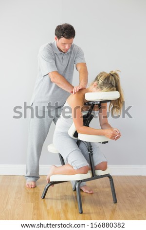 Similar – Image, Stock Photo Content female physiotherapist treating neck of patient