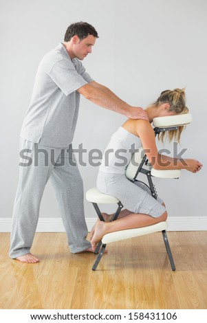 Similar – Image, Stock Photo Content female physiotherapist treating neck of patient