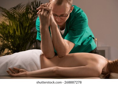 Masseur Using Elbows During Deep Tissue Massage