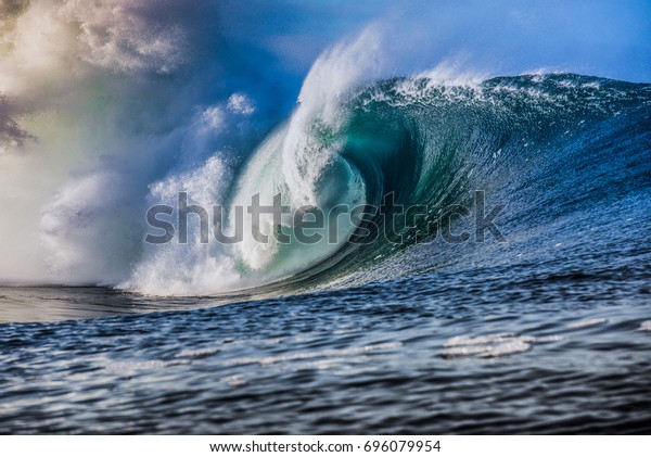 massive blue wave\
breaks