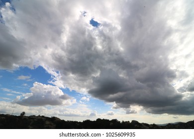 A Massive Cloud Moving Overhead Along The California Coast.