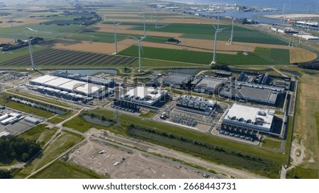 massive data center, computing center, aerial video in the Eemshaven, The Netherlands.