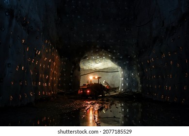 Massive Excavation Underground Mine with Jumbo Drill - Shutterstock ID 2077185529