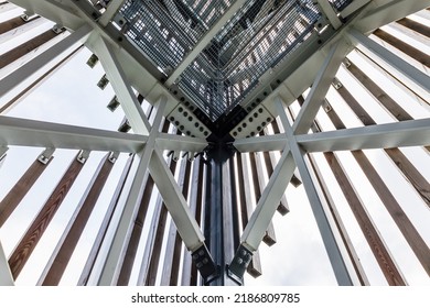 Massive industrial steel construction end-to-end with bolts and nuts on the construction