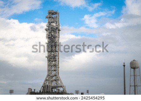 A massive launch tower waits for its next rocket