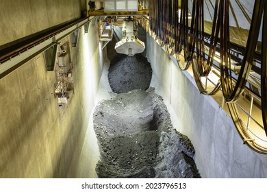 Massive Metal Claw Crane. Chemical Factory Interior.