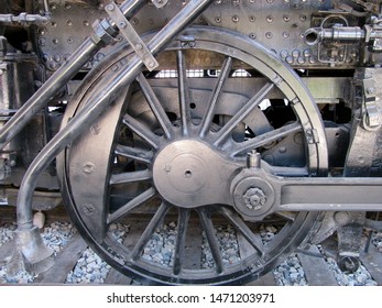 Massive Metal Wheel On Antique Railroad Locomotive That Was Built In 1900 And Logged Over A Million Miles For The Southern Pacific Company. 