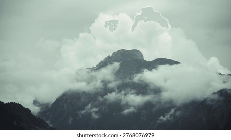 Massive Mountain Covered in Clouds