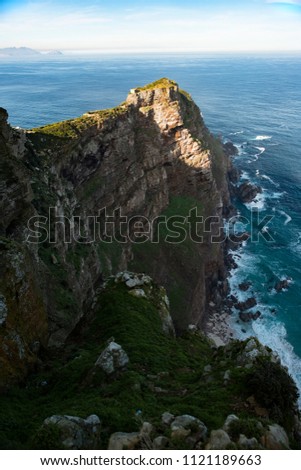 Similar – Image, Stock Photo Green rocky coast at a calm sea in northern Spain