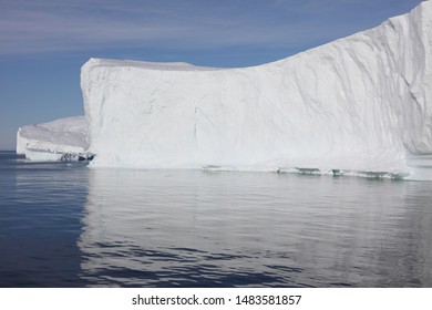 Massive, Towering Icebergs Drift And Melt In Disko Bay (western Greenland). Icebergs Make Up 50% Of The Mass Loss From The Greenland Ice Sheet