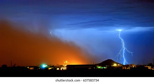 A Massive Wall Of Dust Rolling Into A Rural Area West Of Phoenix Arizona. This Storm Came In At Night And Was Only Revealed When Lightning Flashed Near It. These Storms Are Also Called Haboobs.