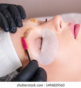 The Master Apply Scrub On Eyebrows With Brush For Prepare Them To Dyeing.