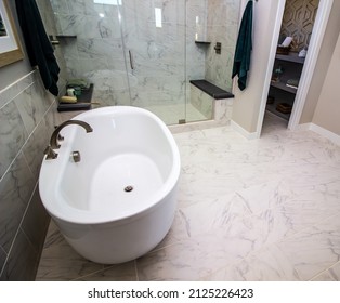 Master Bathroom With Bath Tub And Walk In Glass Shower