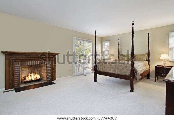 Master Bedroom Brick Wood Fireplace Royalty Free Stock Image