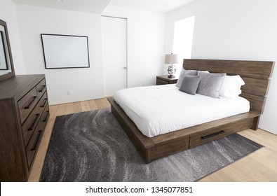 Master Bedroom With Pictures On The Wall In A Modern Family Home, Sunlight, No People