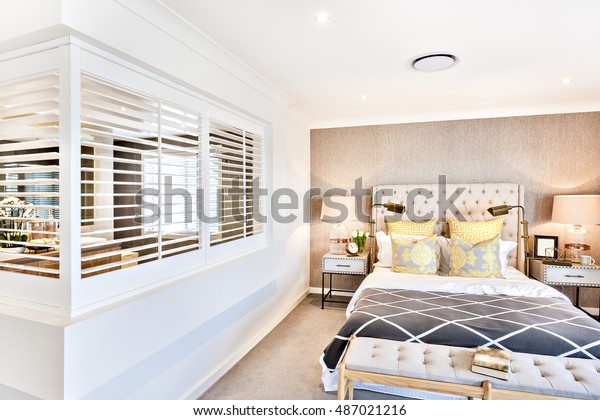 Master Bedroom Yellow Pillows Attached Bathroom Stock Photo