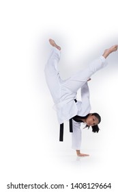 Master Black Belt TaeKwonDo instructor Teacher show traditional Fighting Act pose and warm up in White former dress, studio lighting white background isolated, copy space, motion blur on foots hands - Shutterstock ID 1408129664