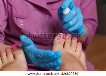 Master chiropody treats fingernails decontamination solution. Concept body care.