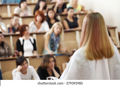  Master Class In The Art Of Hairdressing, Model, And A Lot Of Students Of Hairdressers In The Background, Training