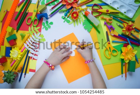 Master class to create a flower from paper.Children's creativity.Favorite hobby for children.Materials and tools.