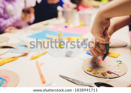 Master class to create a flower from paper.Children's creativity.Favorite hobby for children.Materials and tools.