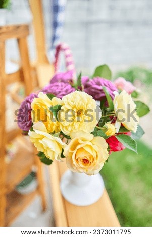 Master class on making bouquets. Spring bouquet in wicker basket. Learning flower arranging, making beautiful bouquets with your own hands