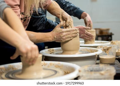 Master class on modeling of clay on a potter's wheel In the pottery workshop - Shutterstock ID 1917299963