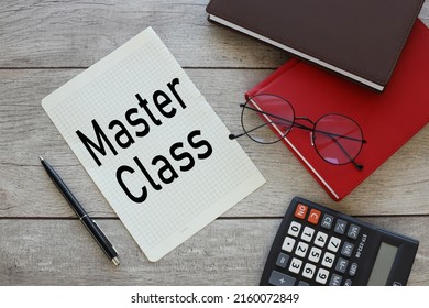 Master Class. torn sheet of paper from a notebook with text on the desktop. business concept - Shutterstock ID 2160072849